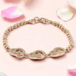Rose Gold Tone Chain Bracelet with CZ Infinity